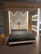 Hotel series mattress in luxury bedroom with contemporary feature wall
